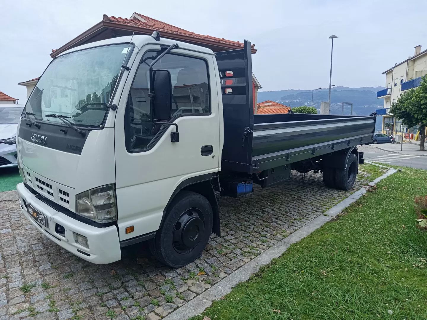 Isuzu  NQR 75 5.2 TRIBASCULANTE - foto 2