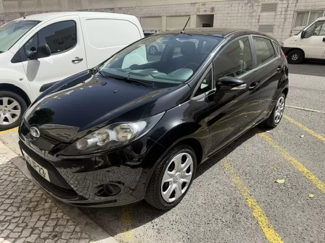 Ford Fiesta 1.4 TDCI - foto 8