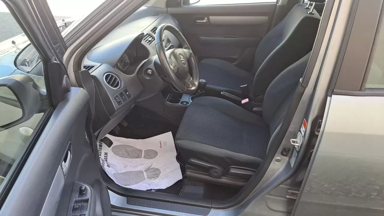 Suzuki Swift 1.3 DDiS GL - foto 6