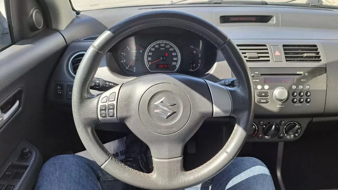 Suzuki Swift 1.3 DDiS GL - foto 8